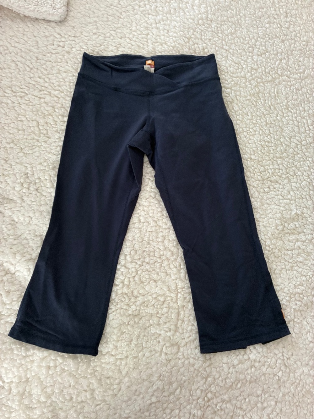 Lucy - Navy - size S low-rise, crossover waist cropped kick-flare legging